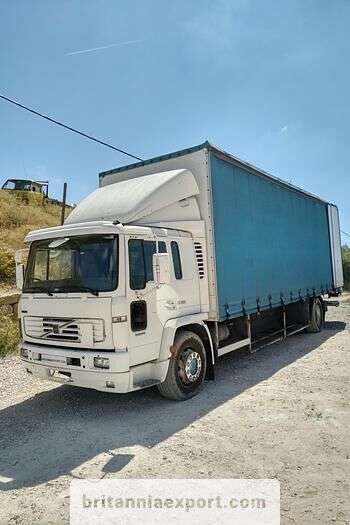 Camiao com lona deslizante VOLVO FL 19 250 19 ton + Iveco Eurotech 190E27 R 19 manual pump